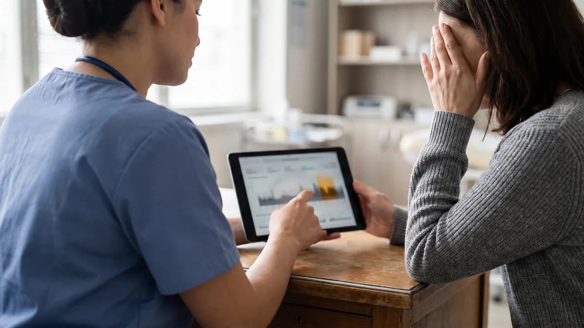 Healthcare professional explaining A1C levels to patient